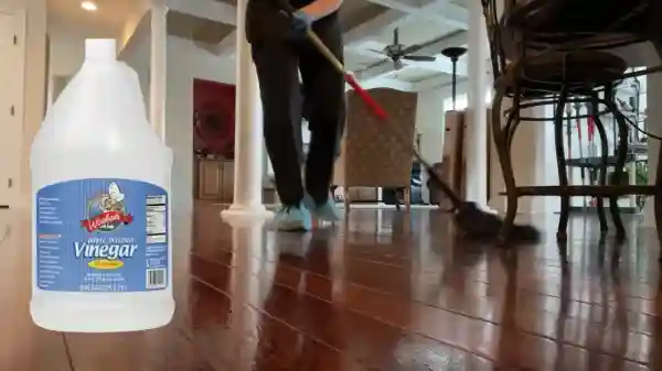 Can vinegar be used to clean syrup off hardwood floors