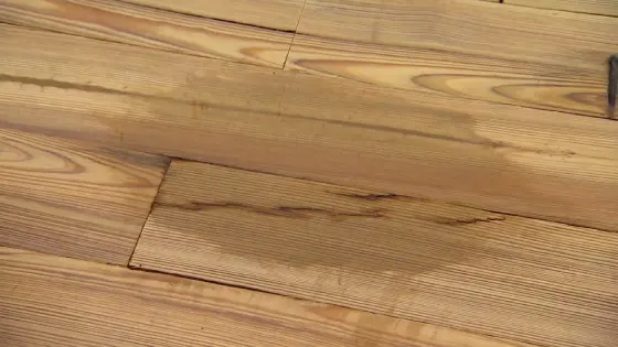 Will vinegar remove bleach stains from the hardwood floor